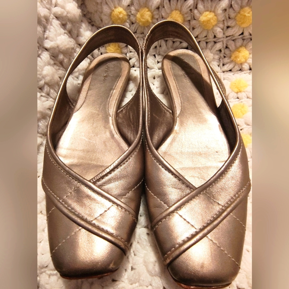 Really cute metallic gold/bronze slingback flats.  Cole Hann /Nike Air Sz8.5